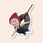 A sticker of a joyful gnome character wearing a red hat, swinging happily on a black tire swing, which is attached to a brown rope.