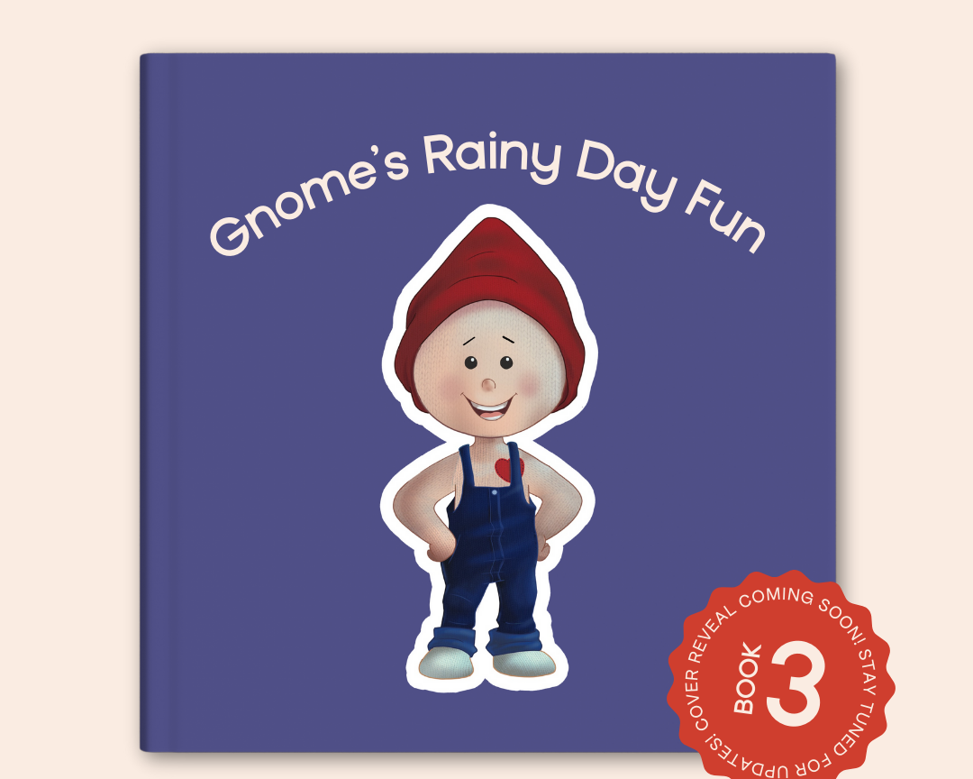 A placeholder image for "Gnome's Rainy Day Fun," a forthcoming book from The Uff Da Sisters. The image features a cartoon gnome on a solid blue background, with the title in white text above, and a seal on the bottom right corner indicating "COVER REVEAL COMING SOON STAY TUNED!" indicating that this is not the final cover.